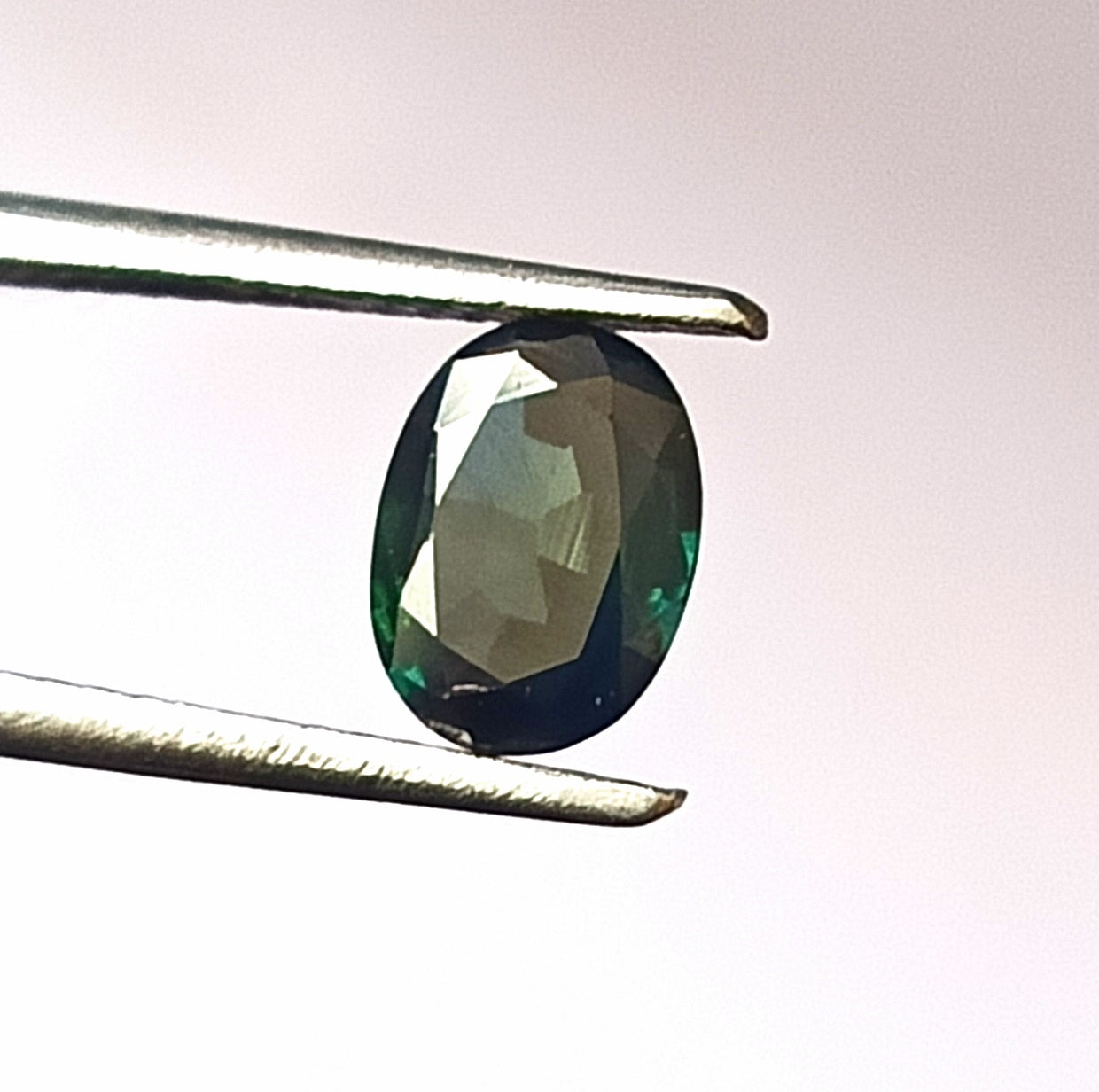 0.90 Carat 5.5X7.2X2.4 (WXLXD) Natural Unheated Oval Shaped Australian Green Sapphire