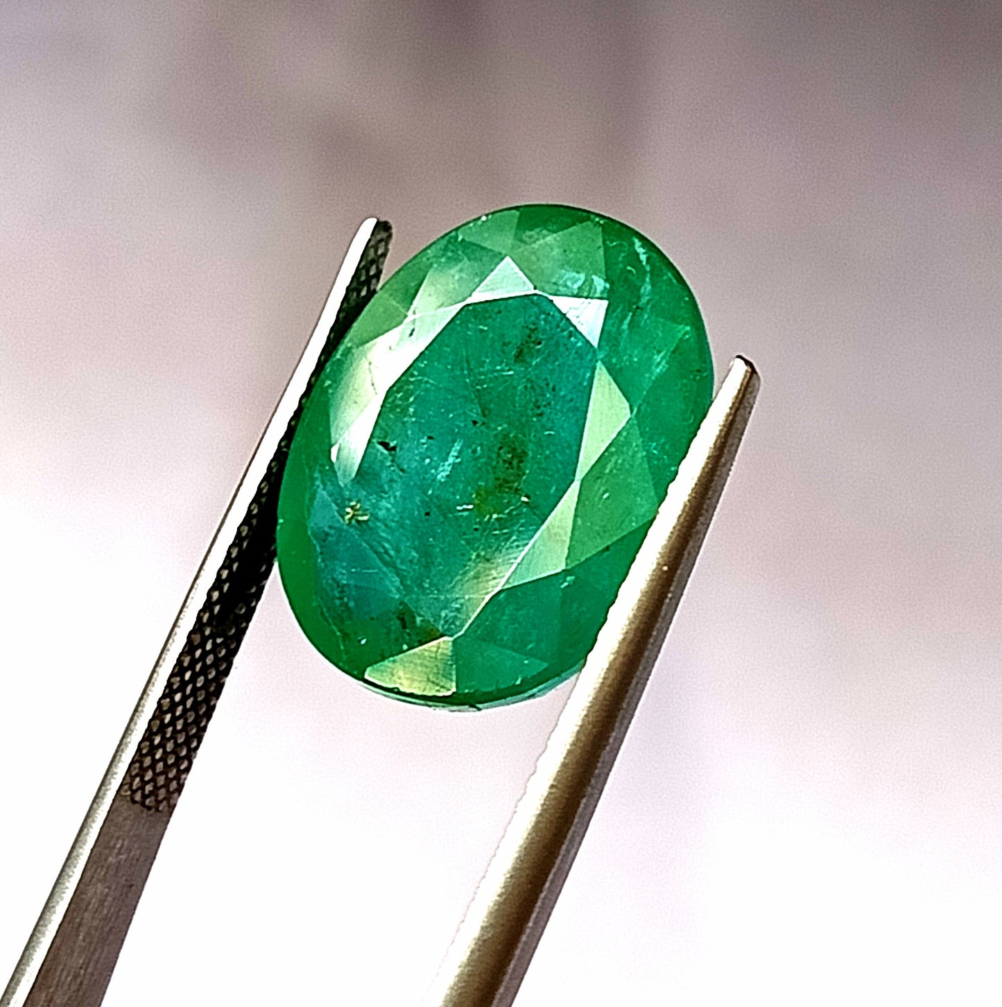14.10 Carat 14.7X17.7X7.5 (WXLXD) Natural Zambian Oval Shaped Emerald
