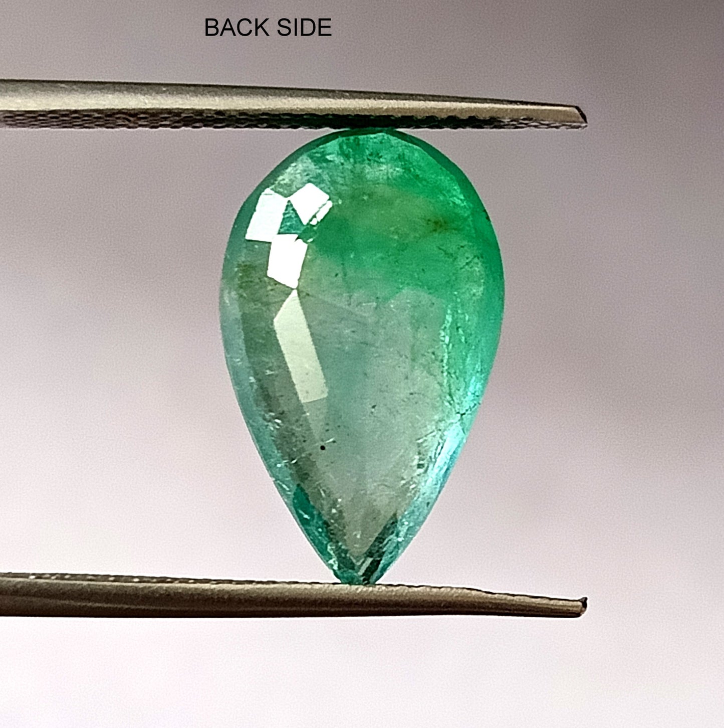 6.90 Carat 10.6X17.5X5.5 (WXLXD) Natural Zambian Pear Shaped Emerald