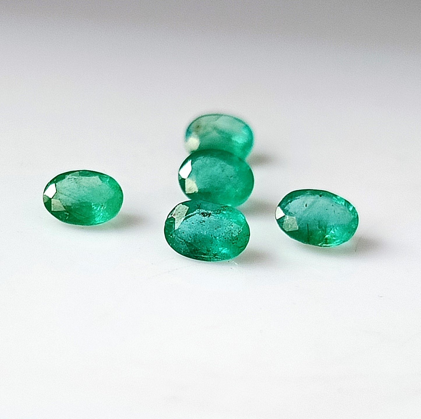 1.75 Carat 5 Pieces 4X5 MM Oval Cut Natural Faceted Zambian Emerald Lot