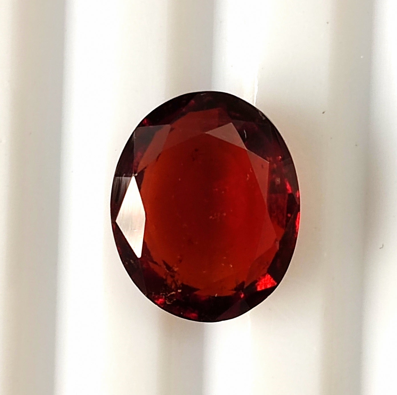 4.75 CARAT 9X11X4.4 (WXLXB) NATURAL OVAL CUT HESSONITE GARNET